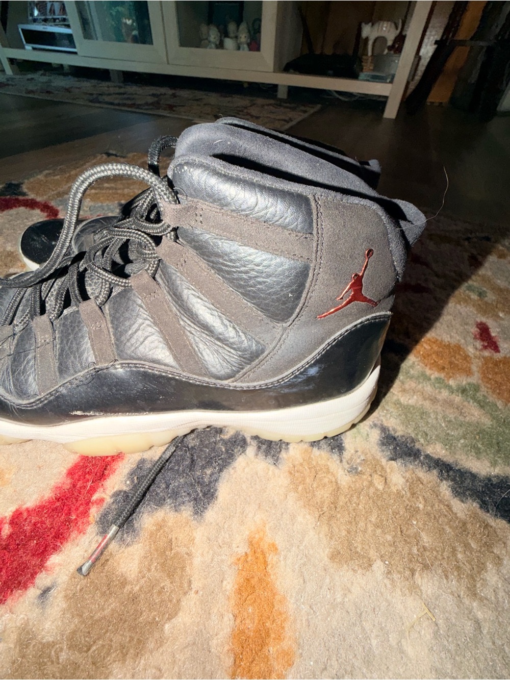 Jordan Black Sneakers with Red Jumpman Accent